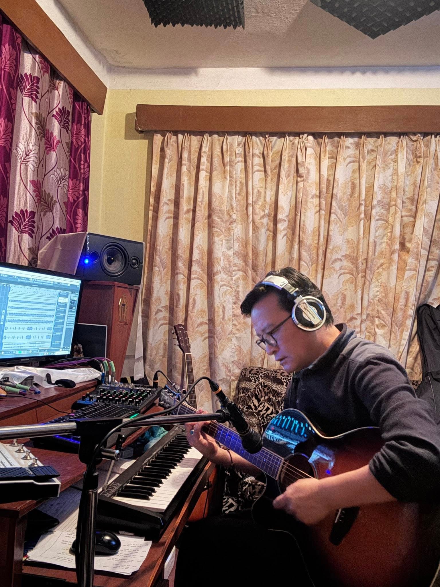 Musician Pema Wangdi Lama composing at VajraStudios, Kathmandu
